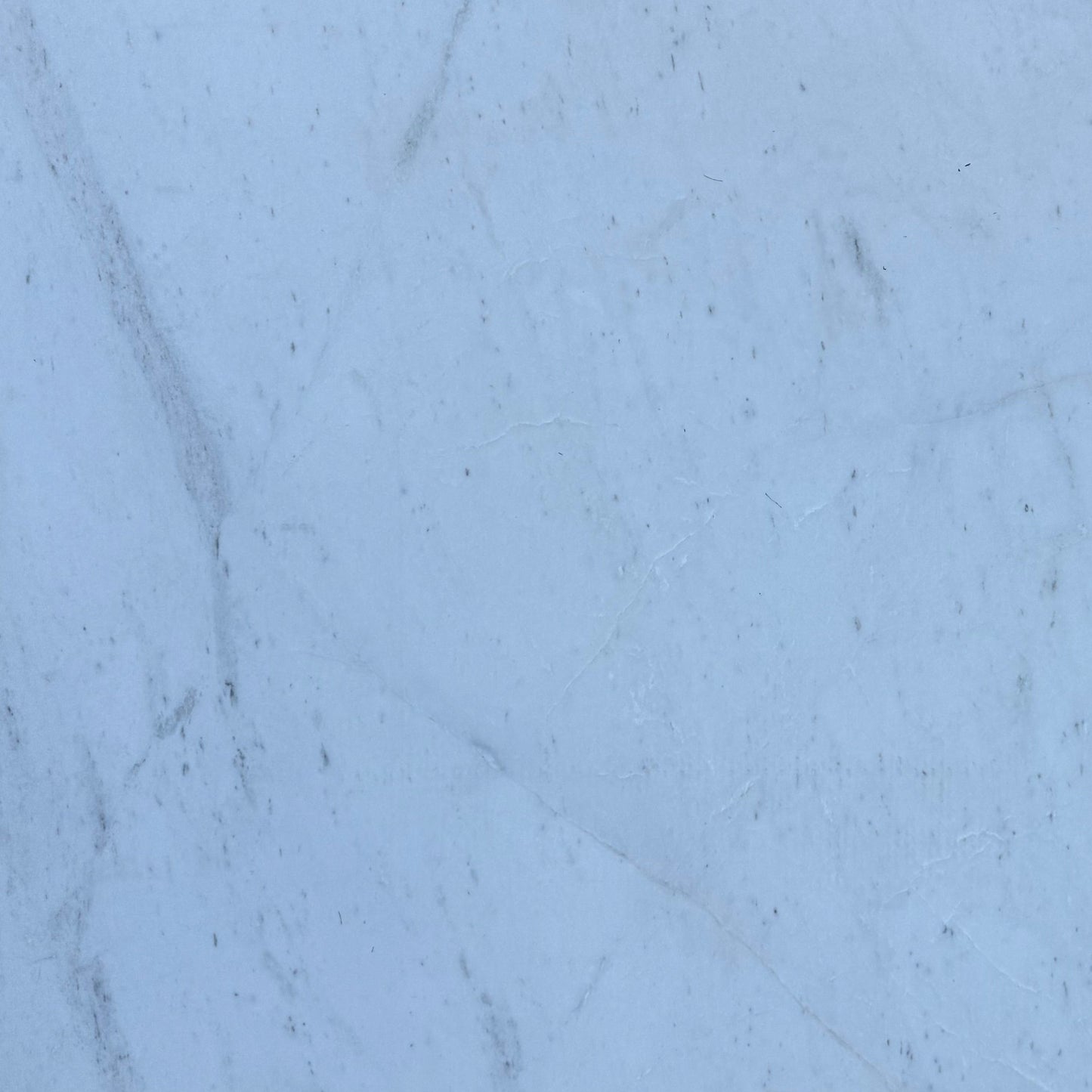 Panda White 2cm Honed Marble 70x39 Location L